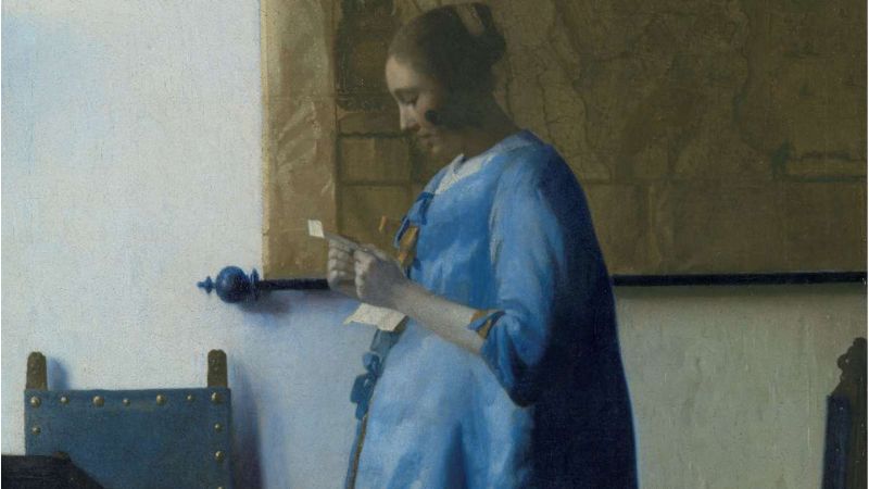 Vermeer. Donna in blu che legge una lettera